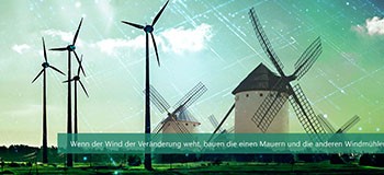 Wind turbines and traditional windmills in a green landscape with a digital overlay, German text at the bottom.